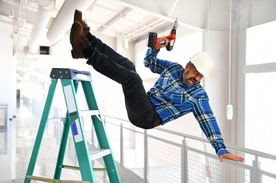Man falling off a ladder