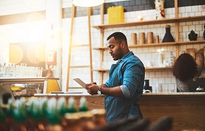 business owner with tablet