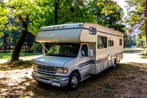 rv parked in the woods