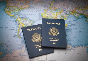 2 passports on top of a map